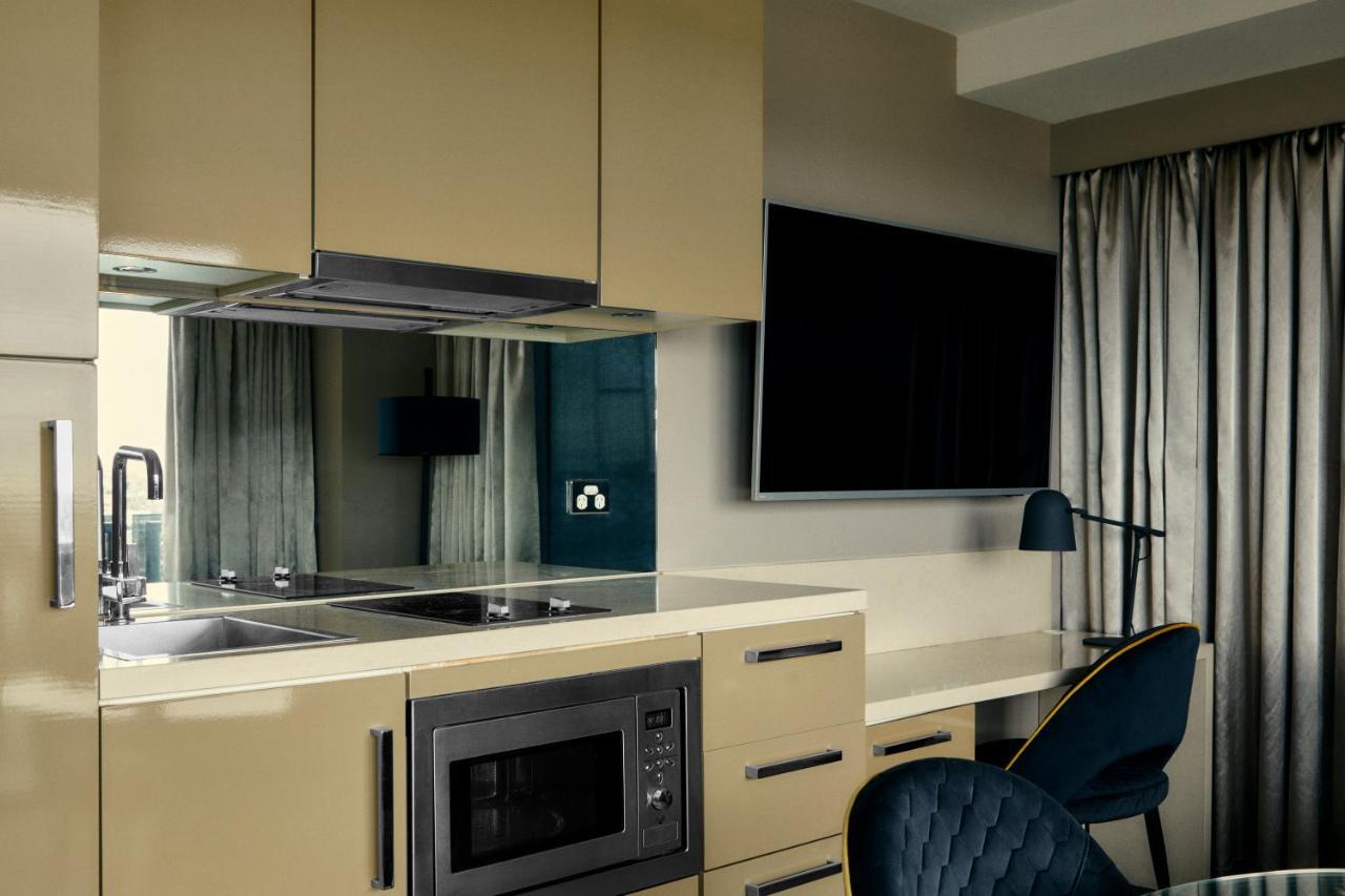 The Kinson Hotell Melbourne Exteriör bild A kitchen in a serviced apartment